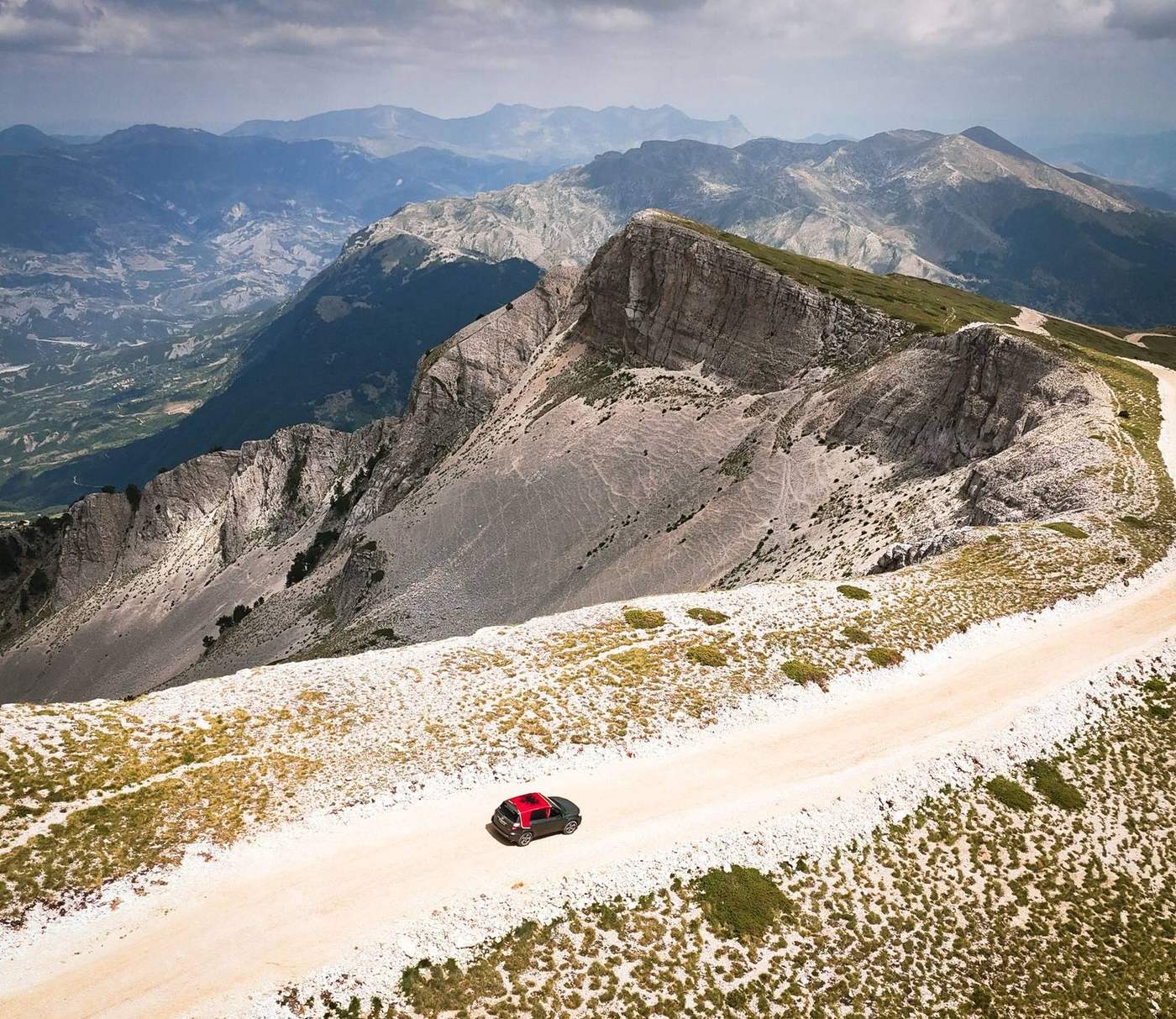 Mountain road across a Balkan border
